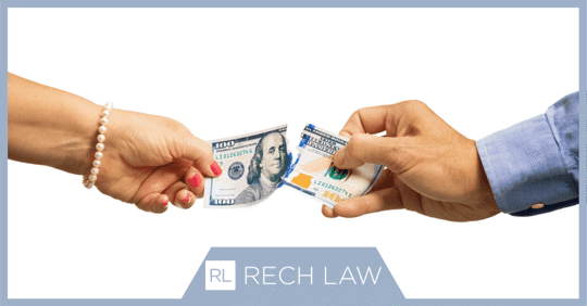 100 dollar bill split in half